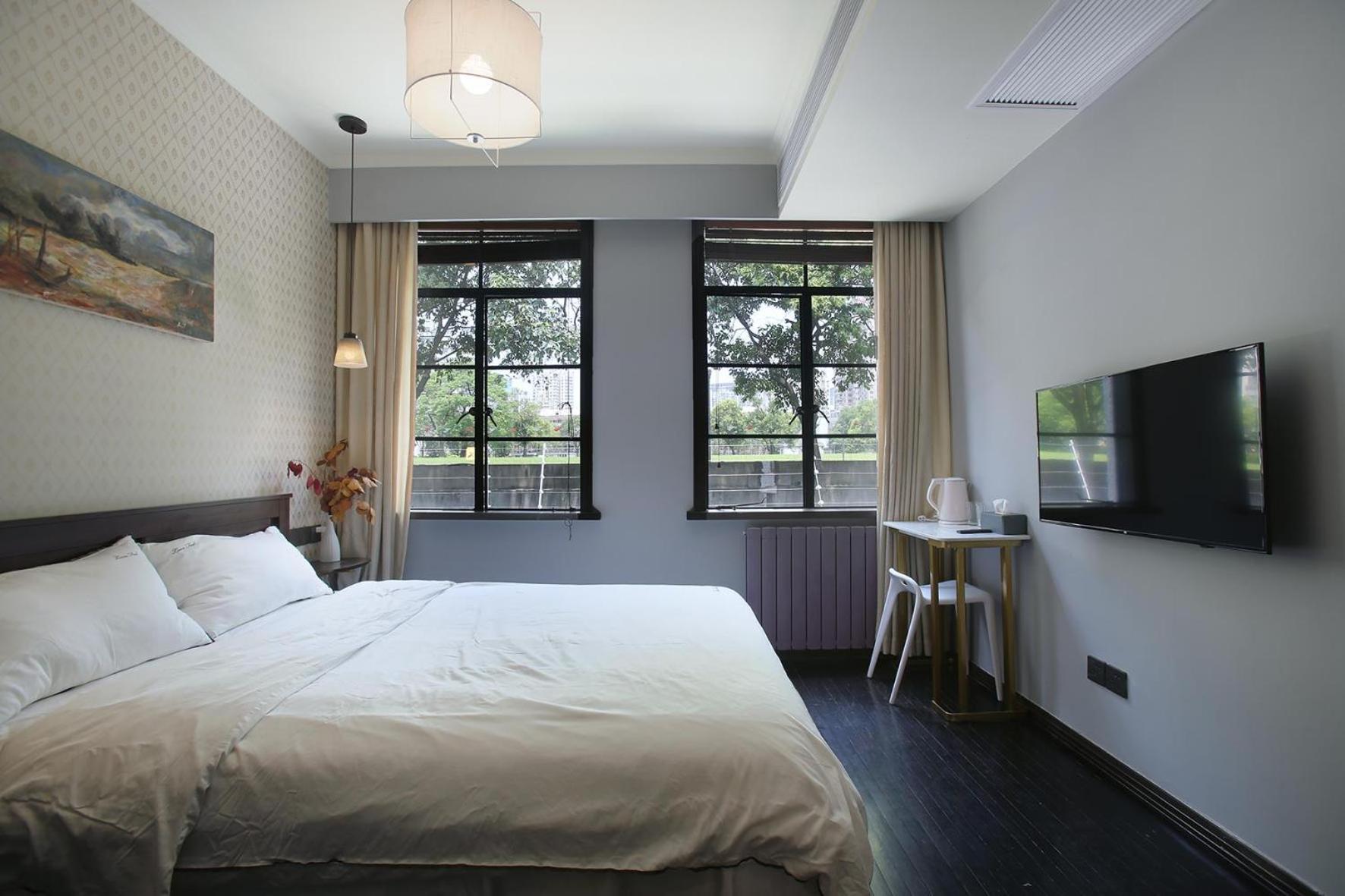 Shanghai Downtown Hills Boutique Guesthouse - Near Metro Line 7, Exit 3, Changping Road Номер фото